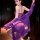 Woman wearing purple french lace sleep dress with sheer trim, elegant bodycon slip nightgown for alluring bedtime style.
