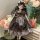 A charming bjd doll dressed in a detailed princess outfit, featuring a plaid dress with ruffles and a bow, perfect for dress-...