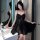 A woman poses elegantly in a black sheer dress featuring lace detailing, perfect for sleepwear or evening wear. the set inclu...