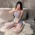 A woman poses in a bathroom wearing a flybird moon gazer cosplay lingerie set, featuring a light blue maid costume with lace ...