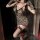 Woman wearing bird moon leopard print lace bodycon nightdress with deep v-neck, cutout detail, and backless design.