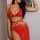 Sexy red rabbit girl costume set featuring intricate gold embellishments, perfect for role play, cosplay, and bedroom fun.