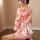 Retro kimono-style lace robe featuring floral patterns, sexy open-front design, sheer sleeves, and waist-cinching bow detail.