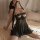 Woman wearing black sheer mesh sleep dress with lace trim and adjustable straps, part of wangchunshan pure-yet-sensual linger...