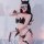 Seductive devil costume lingerie set featuring sexy tie-up thong bodysuit with straps and horns, perfect for themed events or...
