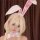 Blonde wig with bunny ears, pink bow tie, and eye mask accessory set for cosplay.