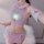 Pink nurse lingerie set featuring sheer cut-out design, playful nurse costume with white accents, perfect for adult entertain...