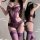 Woman wearing purple lace bodysuit with sheer panels and matching thigh-high stockings, shown front and back view.