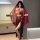A woman models an ancient chinese court-style lingerie set featuring a sensual hanfu doudou and sheer flying skirt with intri...