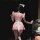 A woman models the baodan maid costume cosplay dress, featuring a cute cat girl design with ruffled sleeves and skirt, perfec...