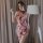 Woman wearing sheer butterfly lace sleepwear set with matching bralette, featuring a short nightgown and no-remove design for...