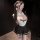 Woman in chao mu lace jk lingerie set with sheer cups, butterfly bow corset, and maid-style skirt.