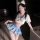 Model wearing chao mu pure sailor-style lingerie set with flirty pleated skirt, white top, and cat ears in dimly lit room.