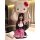 A woman poses with a large hello kitty plush head above her head, wearing a cute maid costume set featuring a black and white...