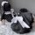 Cute maid costume cosplay dress featuring a black and white ruffled design with a large bow, perfect for plus-size women look...
