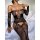 Woman wearing a black european sexy lace bodysuit with sheer mesh, floral embroidery, and open-crotch thong design on a white...