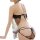 Woman wearing black sheer lace halter bodysuit with matching thong, featuring delicate mesh and bow details for sensual night...