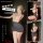 Woman modeling fei niao kui yue lace lingerie set with sheer top, grey mini skirt & garter straps for date night.