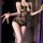 Woman wearing feiniao moonbird sheer floral lace bodysuit with open-crotch design and delicate straps.