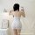 Woman in white floral bodycon nightgown with lace trim, taking mirror selfie. features built-in padded bra and contrast strap...