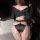 Sexy black silk lace panties featuring high slits and a cut-out cross detail on the top, offering a pure and tempting look wi...
