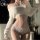 Elegant white cloud top with lace detailing, revealing undergarments for women. stylish design highlights feminine allure.
