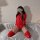 Red latex bodysuit with open crotch design, zippered front, thigh-high stockings, fetish costume featuring tight restraint an...