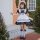 A young girl wears a charming japanese girl black maid dress, featuring ruffled sleeves, a white apron with black trim, and b...