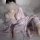 A woman wears a delicate japanese kimono-style sheer lace bikini set paired with a chiffon sleep dress, featuring an open-fro...