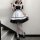 Japanese maid costume dress featuring black and white colors, cute anime lolita style with ruffles and bow details, perfect f...