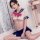 Sexy jk uniform role play lingerie set featuring a pleated mini skirt and sailor-style top with a large bow, perfect for adul...