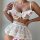 Woman wearing white lace cut-out lingerie set with sheer bodysuit and matching thong, featuring delicate floral patterns and ...