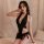 Sexy black one-piece with deep v-neckline and open design, featuring a tie-front skirt style, perfect for bodycon clubwear co...