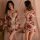 Elegant floral design with deep v-neck and sheer kimono style, perfect for luxurious nightwear.