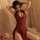Sexy red lace cheongsam outfit featuring sheer cut-outs and traditional knotted buttons, perfect for elegant evening wear.