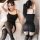 Woman wearing mannyqing sensual lace bodysuit dress - sheer backless sleepwear set, posing on a couch with sheer stockings.