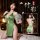 Elegant green cheongsam sleepwear with deep v-neckline and side slit, featuring pearl embellishments and lace camisole set fo...