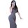 A woman poses with her phone, wearing a sleek gray sleep dress that highlights her figure. the backless design accentuates he...