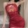 Sexy night-seduction lace chemise in rich red satin, featuring intricate lace design and tie-front detail, perfect for intima...