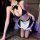 Woman kneeling in black and white lace-trimmed maid lingerie set with bow choker, sheer stockings, and satin apron — nightsig...