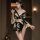 Elegant black and white floral japanese geisha sleepwear set featuring a silky robe with ruffled sleeves, perfect for cosplay...