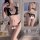 Woman modeling black lace pearl temptation thong lingerie set with pearl details, sheer bra, and garter-style panties.