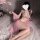 Vintage chinese hanfu style dress featuring a sparkling lace bodice with gold accents, paired with a flowing pink skirt, perf...