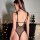 Sexy black bodysuit with adjustable straps, sheer design, perfect for bondage style lingerie.