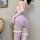 Woman wearing a pink strapless lace bodysuit with white fishnet stockings, showcasing the pure & alluring lace bodysuit for a...