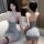 Woman modeling silver lace bodysuit dress with sheer neckline and mesh stockings, front and back view.