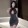 Woman wearing pure & alluring lace bodysuit, a sexy strapless nightclub secretary dress with shimmering skirt and lace top.