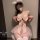 Woman wearing pink pure & playful lingerie set with bow, tulle skirt, and bunny ears—seductive maid outfit for playful nights...