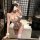 Woman in mirror wearing pure & playful lingerie set – seductive white lace bodysuit with cat ears, wrist cuffs, and thigh-hig...