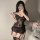 Woman modeling black lace corset vest and garter set from pure & playful lingerie set — sexy minimalist sleepwear with sheer ...